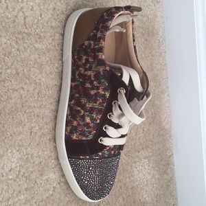 Louboutin women’s sneakers in size 7.5b